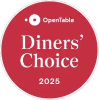 The image shows a red badge with "OpenTable Diners' Choice 2025" written on it, indicating an award or recognition.